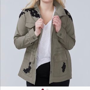 detailed khaki green jacket with button detail pockets and inside drawstring